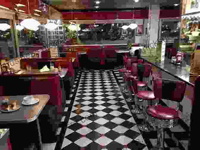 An Appetizing Display Of A Variety Of Classic American Diner Dishes, Beautifully Presented On A Rustic Wooden Table With A Vintage Style Diner Background. Poole S: Recipes And Stories From A Modern Diner A Cookbook